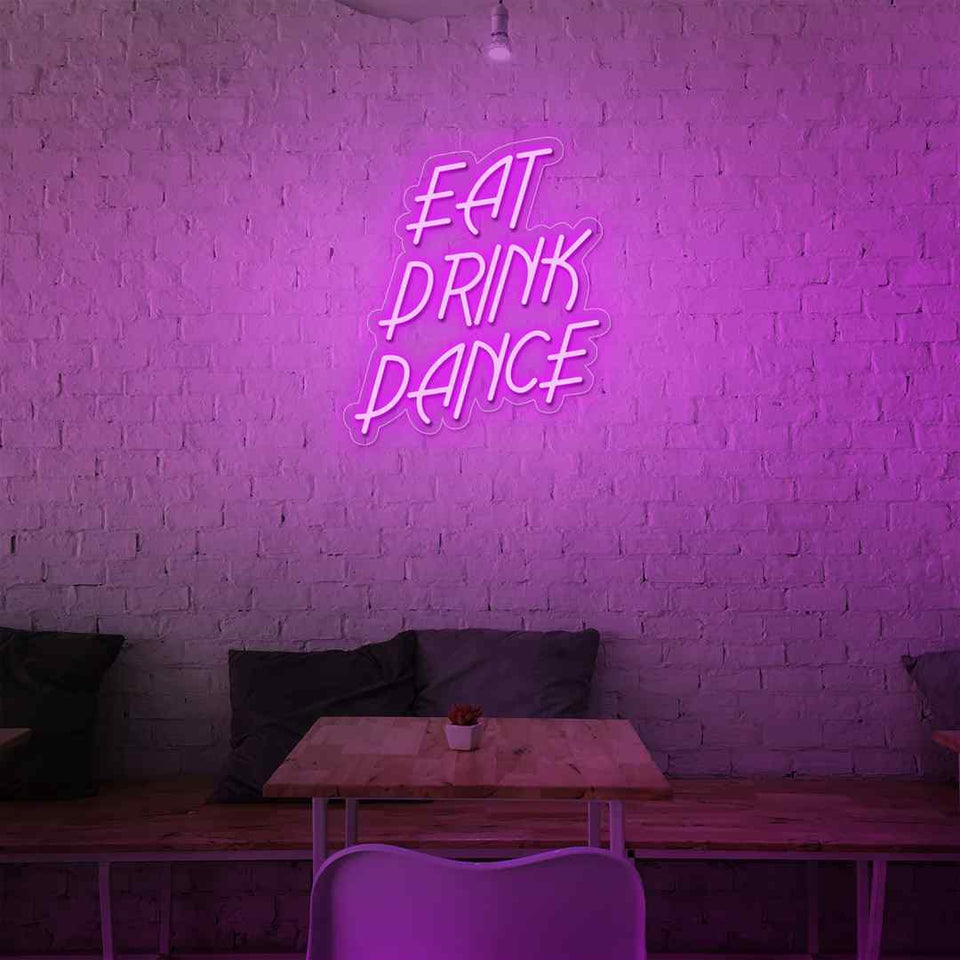 Eat drink dance neon sign
