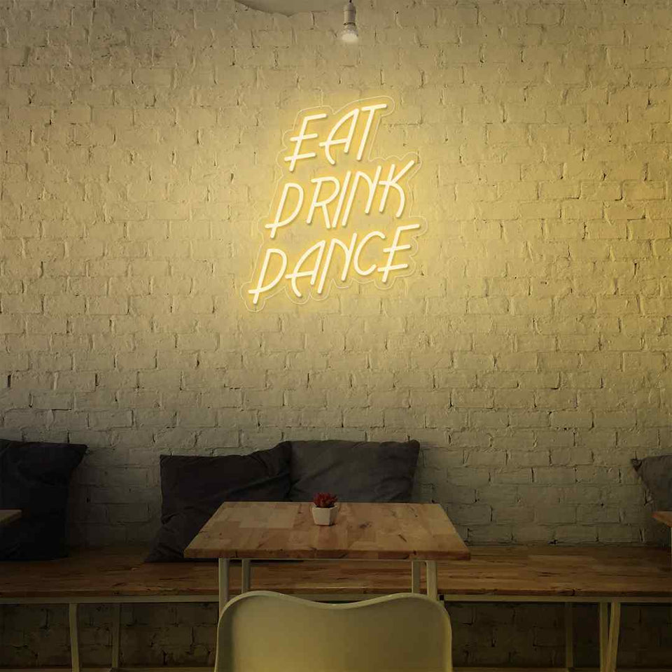 Eat drink dance neon sign