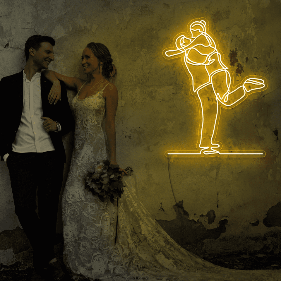 Lovely Couple LED neon sign in golden yellow color - from Neonmarvels.com