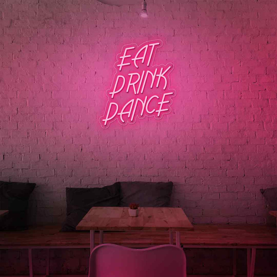 Eat drink dance neon sign