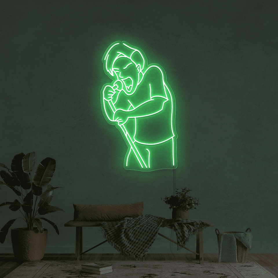 A singer as an LED neon sign in green color designed by Neon Marvels