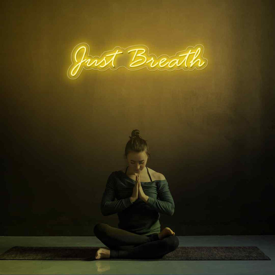 Just breathe neon sign