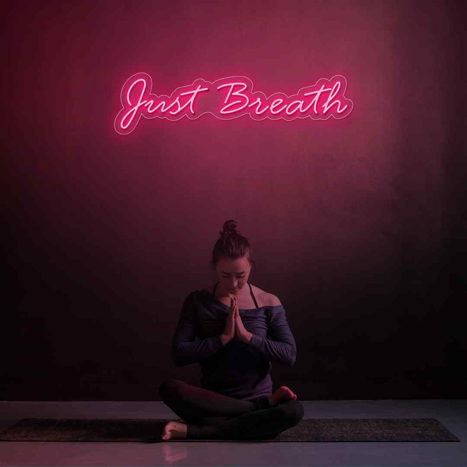 Just breathe neon sign