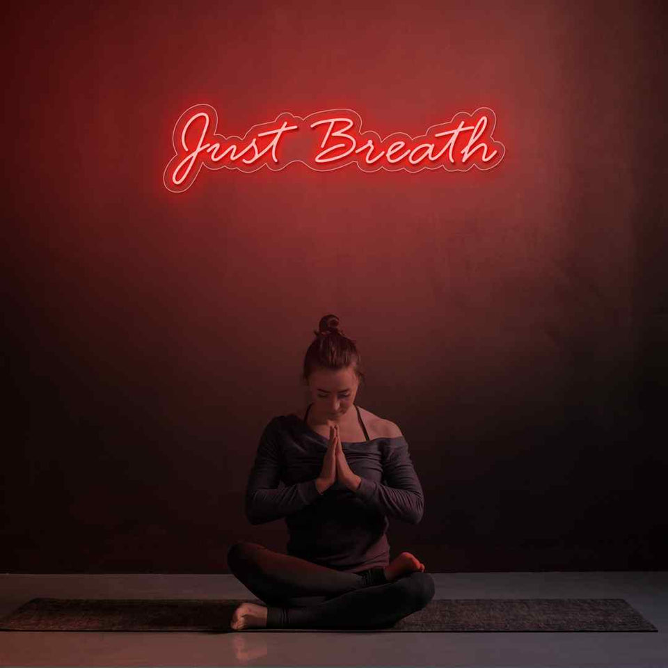 Just breathe neon sign