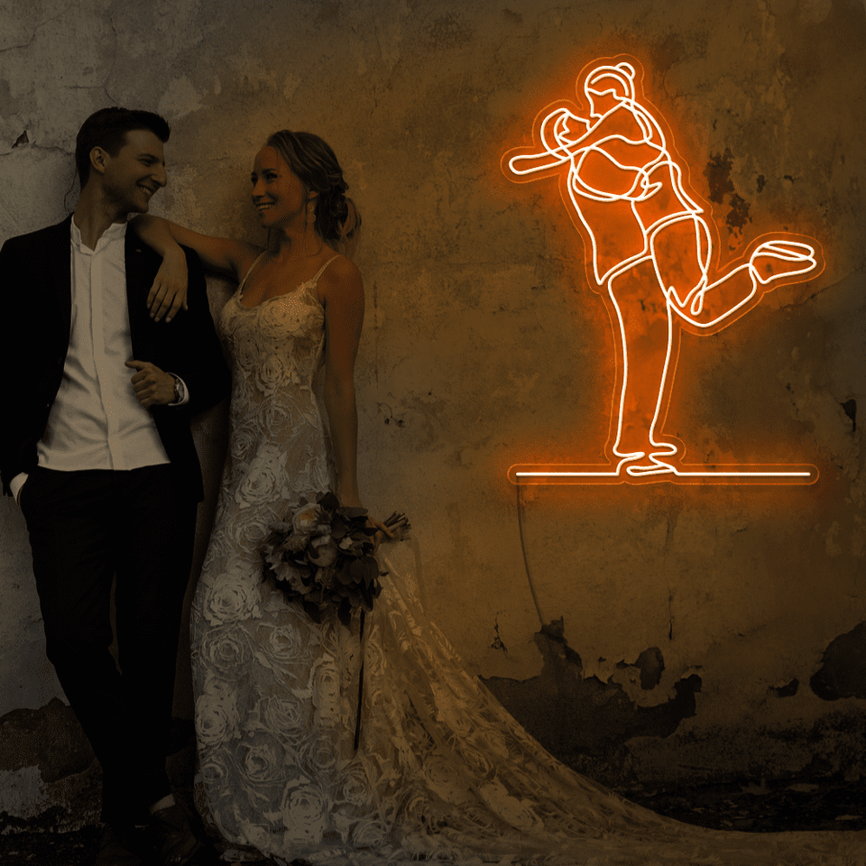 Lovely Couple LED neon sign in orange color - from Neonmarvels.com