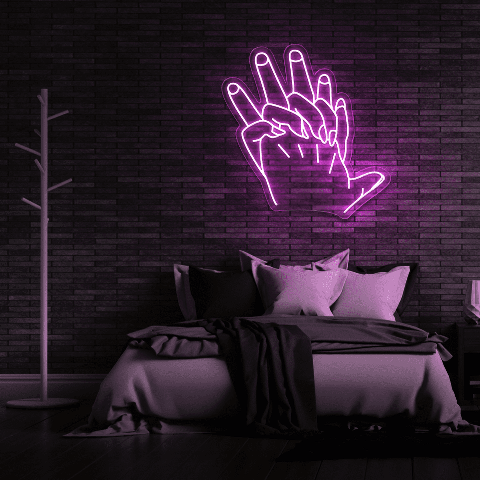 Holding Hands LED neon sign in pink color by Neon Marvels