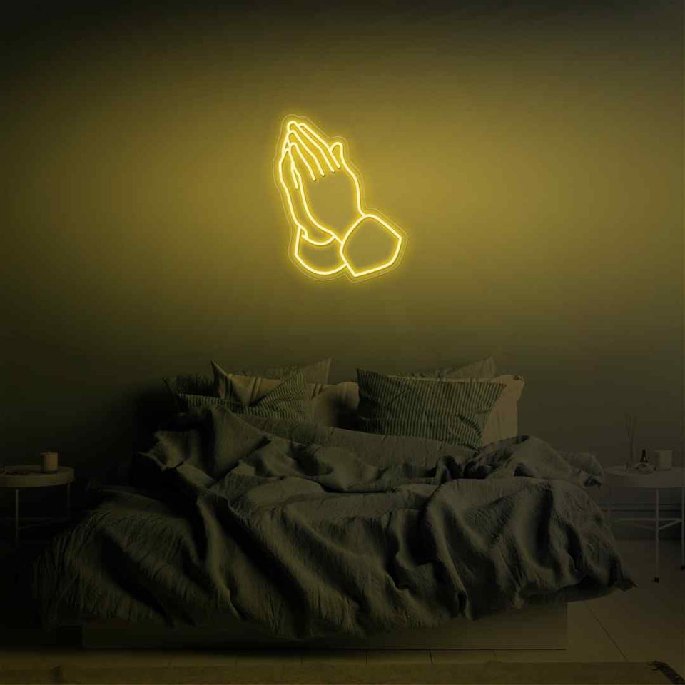 Praying hands neon sign